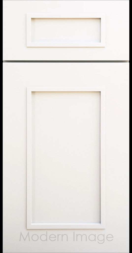 Gilbert cabinet a recessed flat panel and elevated molding in Dove White color.
